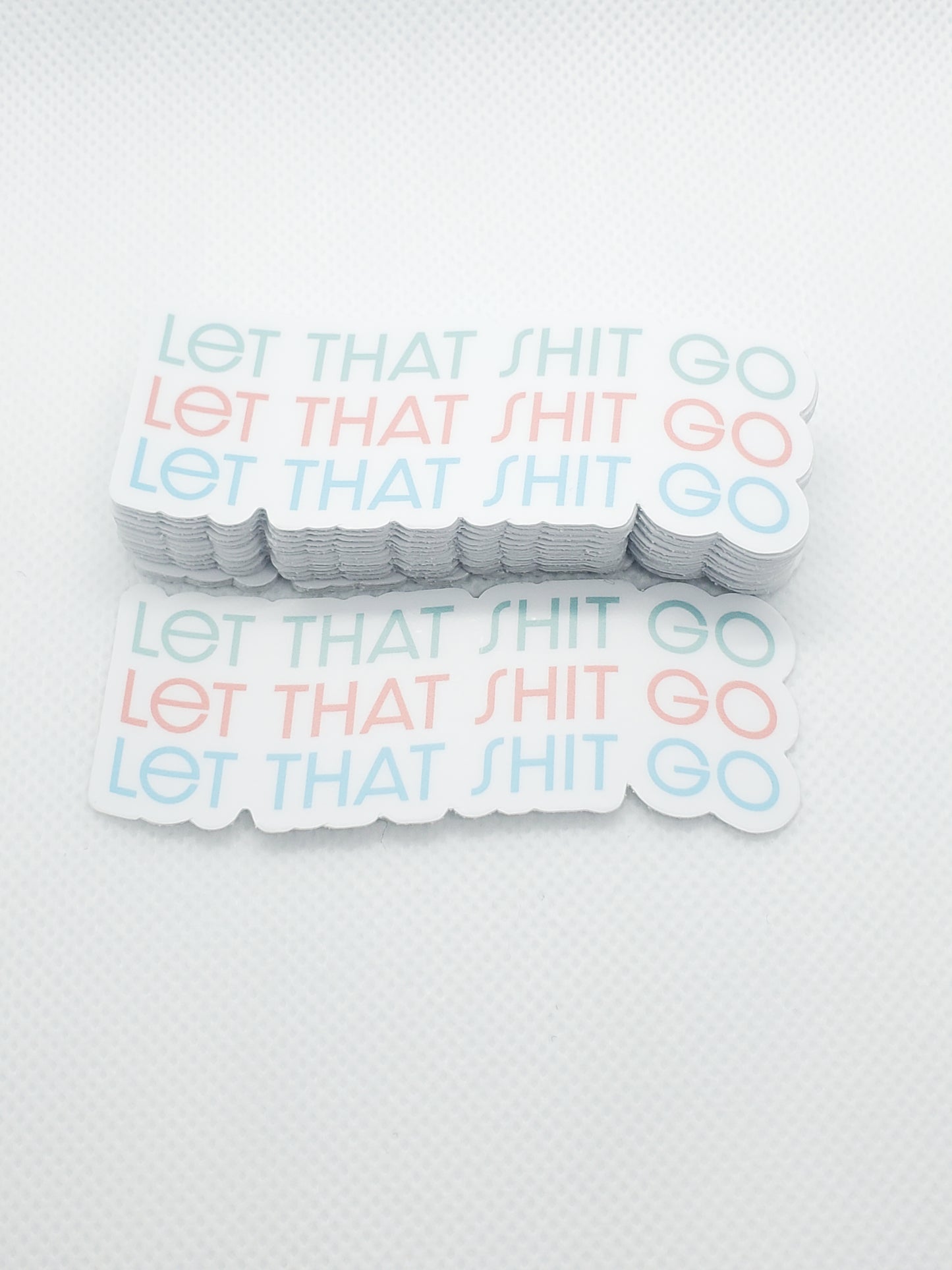 'LET THAT SHIT GO' STICKER