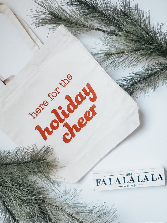 here for the holiday cheer tote bag