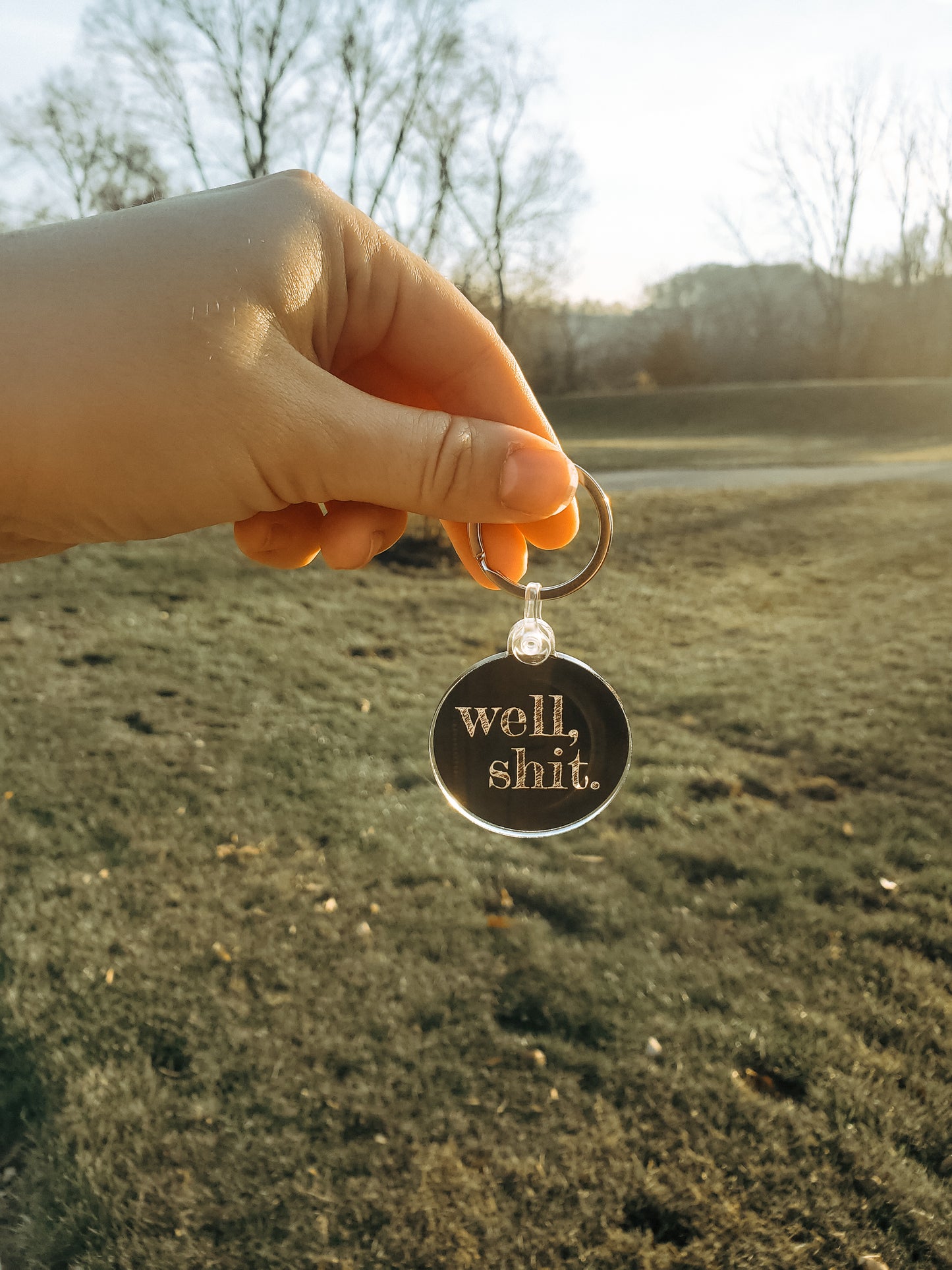 'well shit' keychain