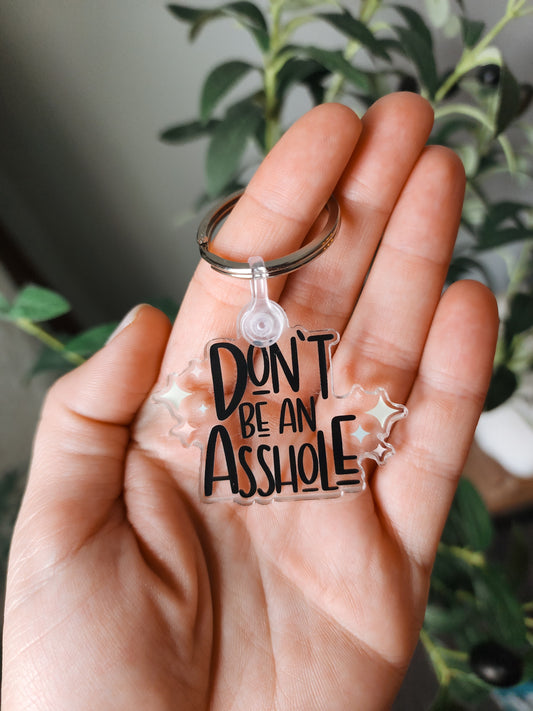 don't be an asshole keychain